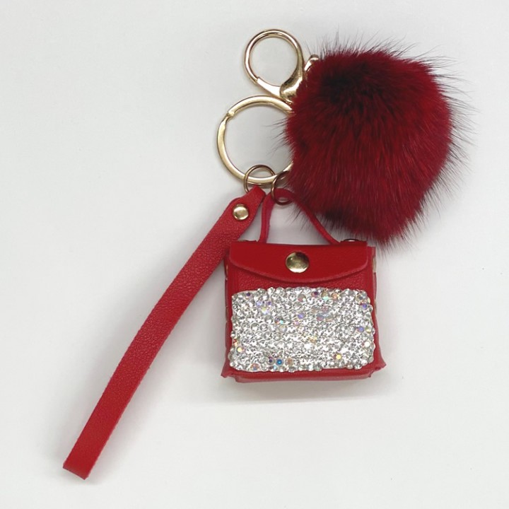 Taschenanhänger Mini Kelly Bag mit Swarovski Steinen und Nerzbommel